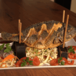 DORADĂ PRĂJITĂ SERVITĂ CU SOS DULCE ACRIȘOR-<br>SWIMMING FISH-FRIED SEA BREAM WITH SWEET AND SOUR SAUCE